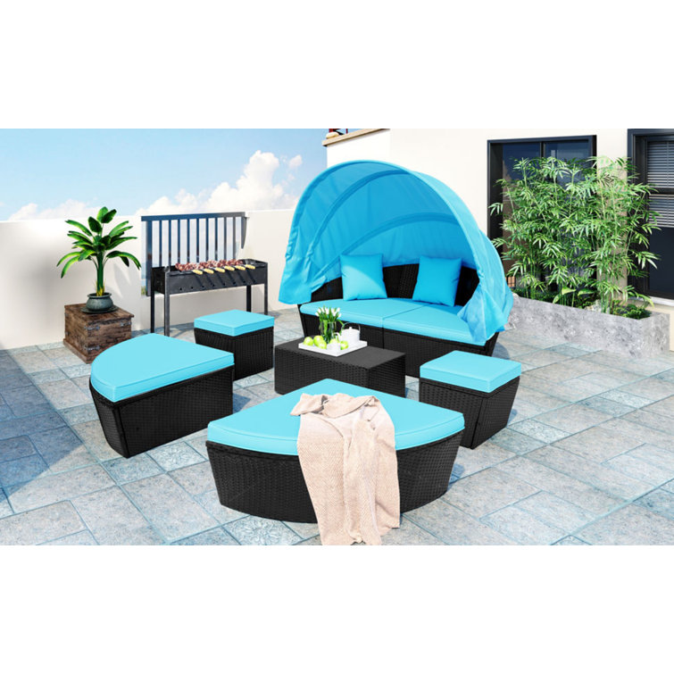 Outdoor sectional store with black cushions